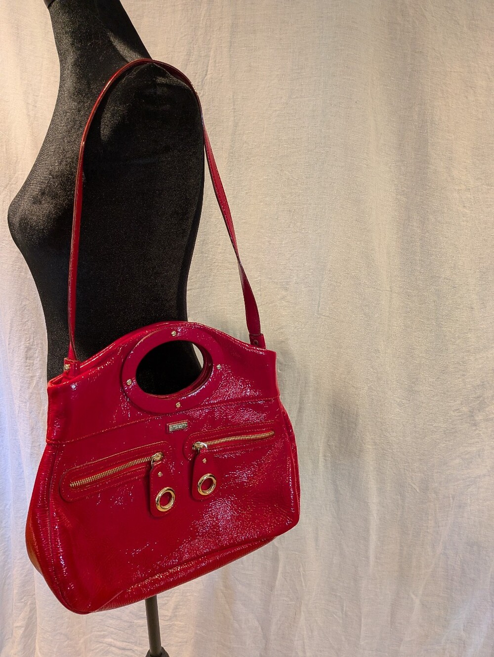 Kate Spade red patent leather purse with gold accents